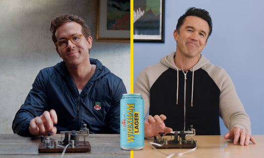 Rob McElhenney and Ryan Reynolds and a can of Wrexham Lager